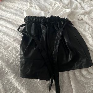 Black and white romper with a tie